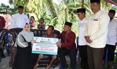 Bupati Kasmarni Apresiasi Program Bedah Rumah Baznas