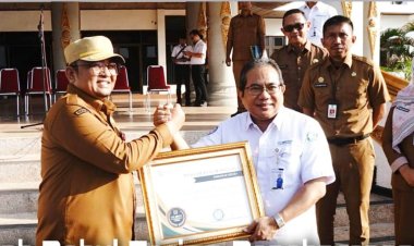 Capaian UHC 97, 42 Persen, Pemkab Rohul Terima Penghargaan dari BPJS Kesehatan Wilayah II