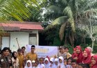 Kolaborasi Mahasiswa KKN-MAs Kelompok 100 UMRI dan Masyarakat Tanam Matoa di Desa Rawang Kao Barat