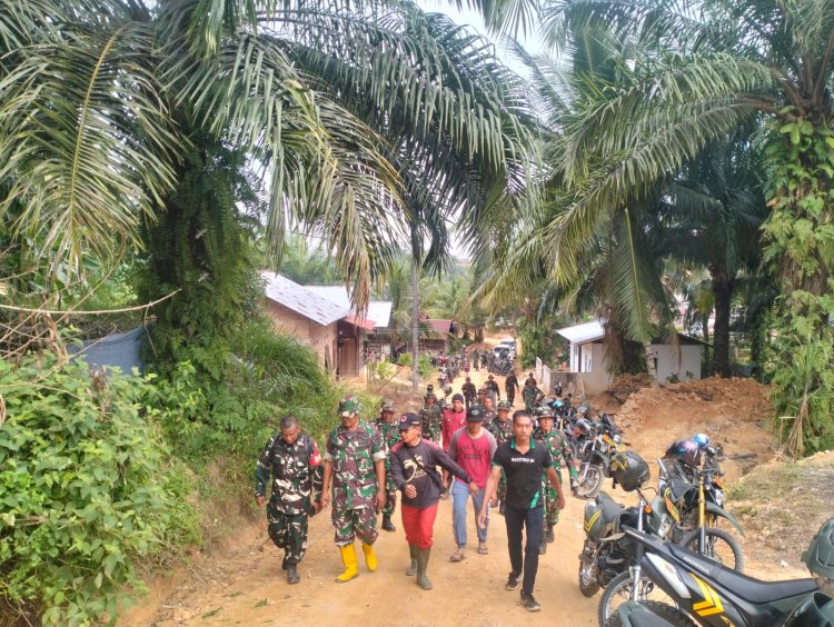 Satgas TMMD ke-127 Kodim 0301/Pekanbaru dan Warga Tuah Negeri Satukan Langkah Bangun Desa