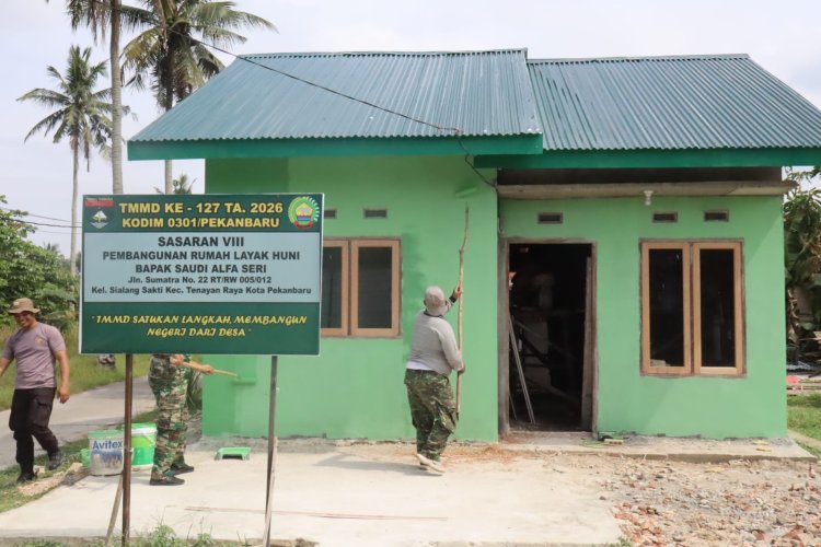 Satgas TMMD ke-127 Kodim 0301/Pekanbaru Wujudkan Rumah Impian Saudi Alfa Seri dengan Semangat Kebersamaan