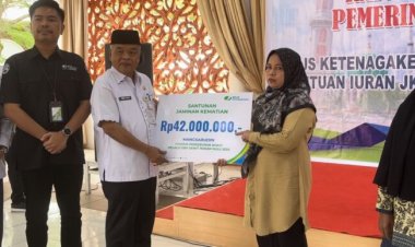 Pemkab Rohul Salurkan Bantuan Iuran JKK-JKM Rp 62 Miliar